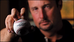 Tim Wakefield shows how he grips his knuckleball  - <%=term%>